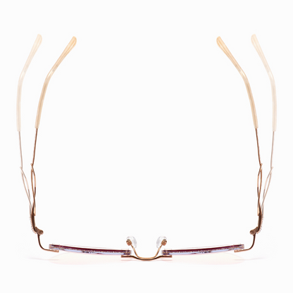 Elevate your style with MieMie Glitter Polygon Rimless Glasses. Featuring durable Metal frames in Champagne Gold with rhinestone embellishment. Our ALL-IN-ONE lenses offer blue light protection, anti-glare, and more at no extra cost. Perfect for fashion-forward Gen Z trendsetters!