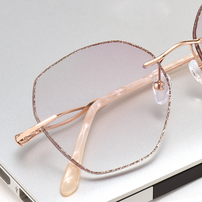 Elevate your style with MieMie Glitter Polygon Rimless Glasses. Featuring durable Metal frames in Champagne Gold with rhinestone embellishment. Our ALL-IN-ONE lenses offer blue light protection, anti-glare, and more at no extra cost. Perfect for fashion-forward Gen Z trendsetters!