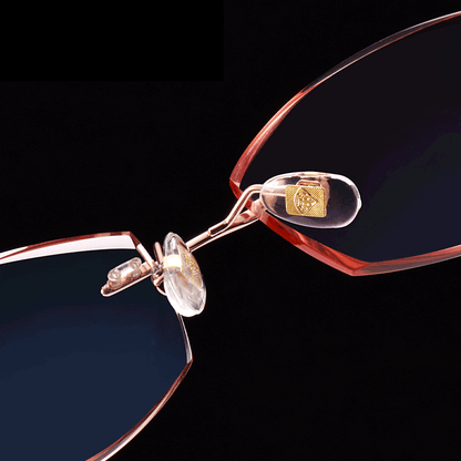 PRE003 is constructed from sophisticated metal, super lightweight and comfortable. Adorned with elegant flower-pattern decorated temple arms and tinted lenses, beautiful diamond-cut lens with rhinestone embellishment, perfect for your style.