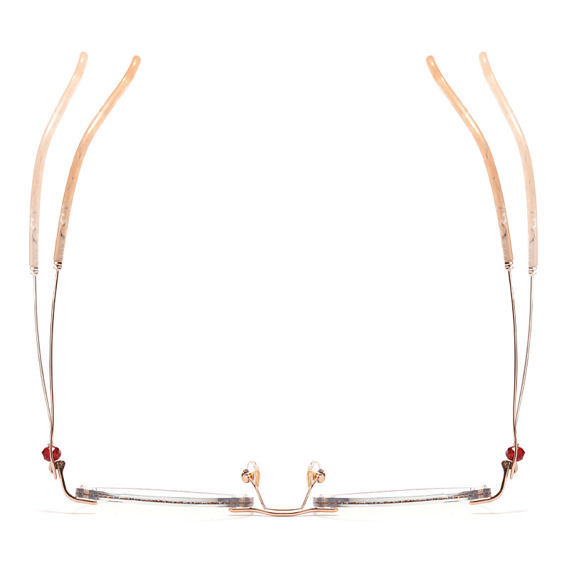 PR015 rimless eyeglasses are crafted from premium metal, making them lightweight, durable, and comfortable. Designed for single-vision lenses, their rimless style beautifully highlights your dynamic and confident personality. Get your pair today!