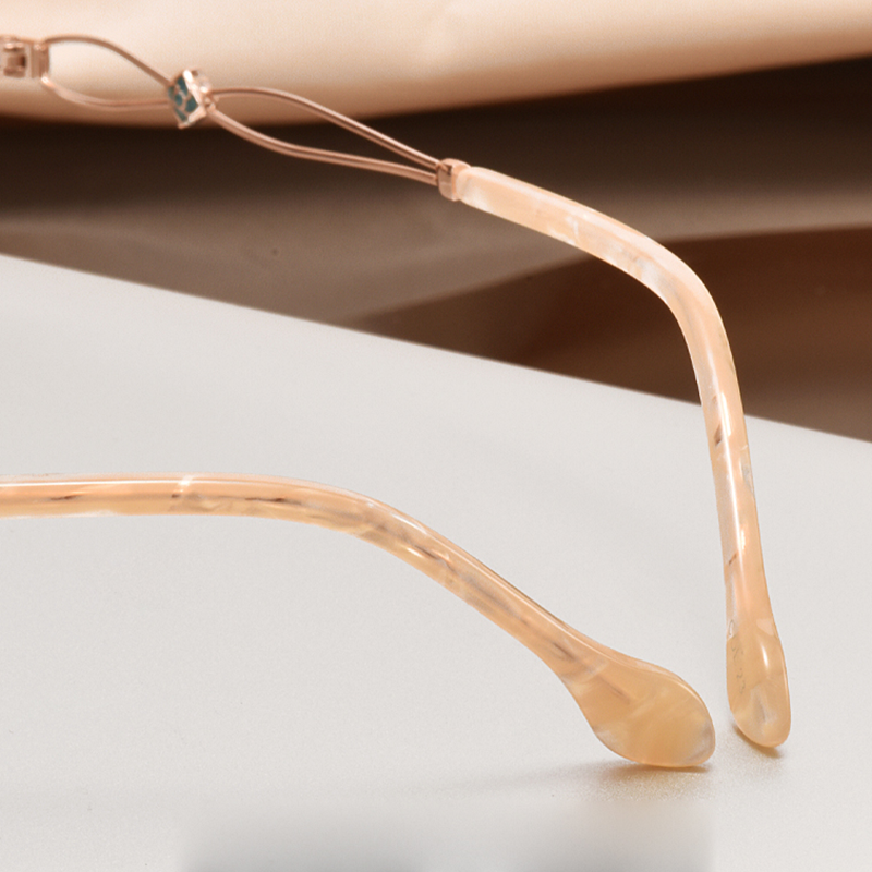 PR015 rimless eyeglasses are crafted from premium metal, making them lightweight, durable, and comfortable. Designed for single-vision lenses, their rimless style beautifully highlights your dynamic and confident personality. Get your pair today!