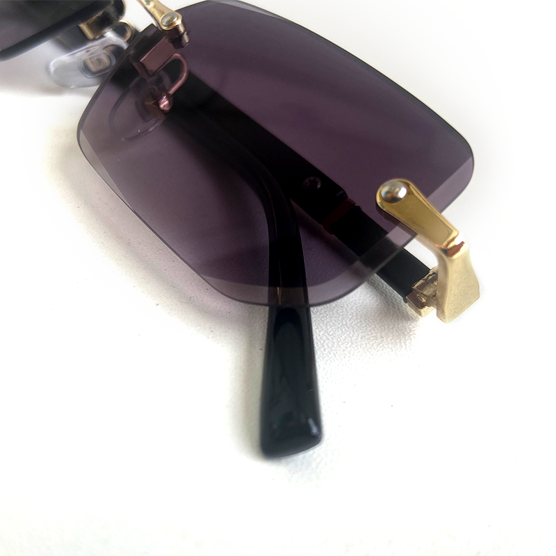 MieMie SSQ007 Rectangle rimless sunglasses feature with polished and sophisticated metal and detail cut lenses. This lightweight frame is functional eyewear without any unnecessary embellishments. For added durability, it comes with impact-resistant polycarbonate lenses. Comes in 6 colors: Purple, Apricot, Black, Brown, Blue, Green