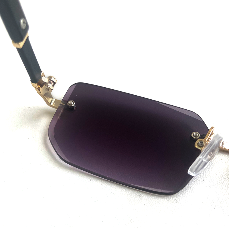 MieMie SSQ007 Rectangle rimless sunglasses feature with polished and sophisticated metal and detail cut lenses. This lightweight frame is functional eyewear without any unnecessary embellishments. For added durability, it comes with impact-resistant polycarbonate lenses. Comes in 6 colors: Purple, Apricot, Black, Brown, Blue, Green