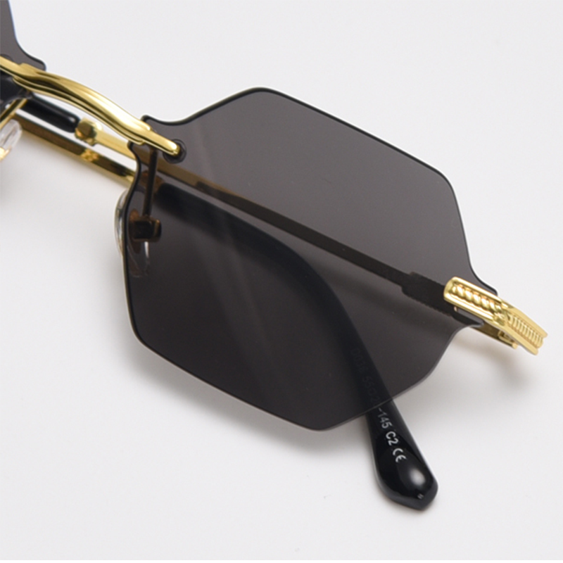 MieMie Polygon Sunglasses SPG001, well-crafted 18k gold metal, a distinctive rim-less design, and a unique geometry style that adds a unique flair to your look. With UV400 protection, they provide excellent defense against harmful rays. Available 9 colors in pink, black, coffee, green, clear, blue, navy, purple, red