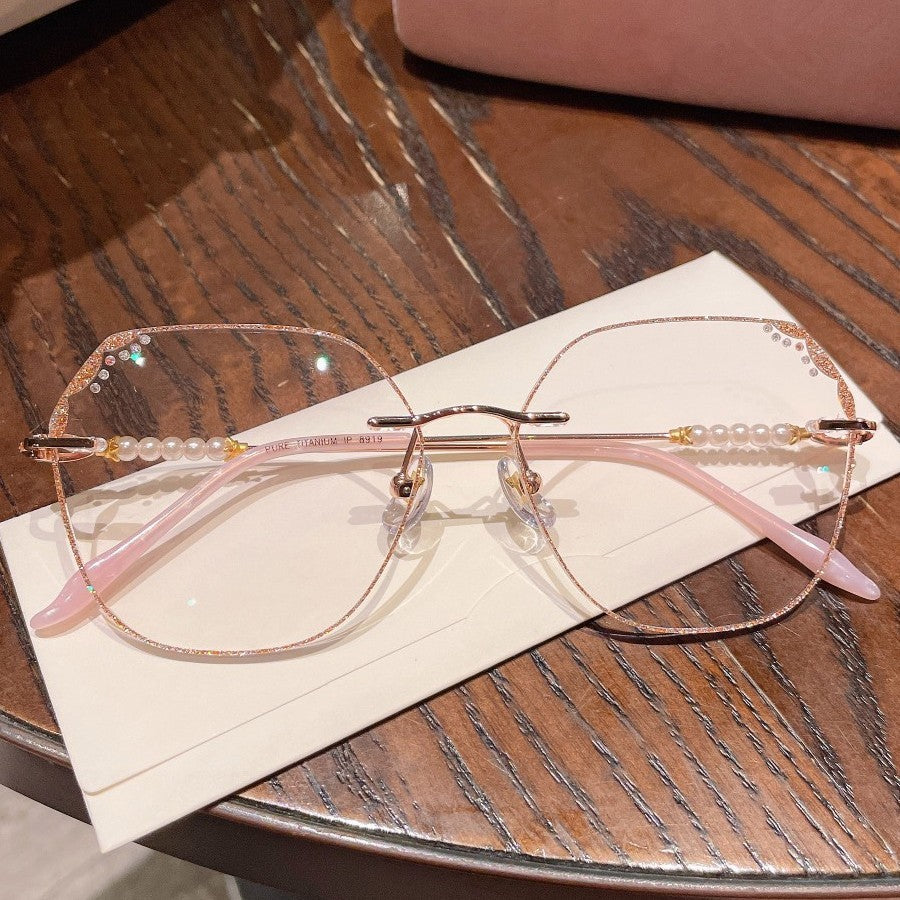 MieMie Shinning Pink Pearl-Embellished polygon glasses. Featuring durable Titanium frames in vibrant pink color. Our ALL-IN-ONE lenses offer blue light protection, anti-glare, and more at no extra cost. Perfect for fashion-forward Gen Z trendsetters!