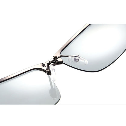 Discover MieMie's photochromic polarized sunglasses, perfect for driving day or night. These men's glasses adapt to light conditions, reducing glare with UV400 protection. Available in black, gray, and silver. Ideal for drivers seeking comfort and eye safety.
