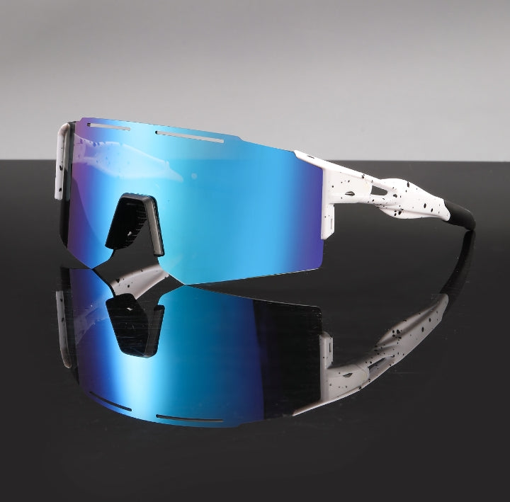 MieMie SP06 sports sunglasses---for a protection against UV400 sun rays to enhance visibility and reduce glare. Photochromic function to deal with any weather condition, unparalleled performance with our premium, designed for athletes and outdoor enthusiasts. Gear up for your next adventure with sport sunglasses. Available in 8 colors: White Red, Light Blue, White, Blue, Orange, Black Blue, White Blue, Yellow