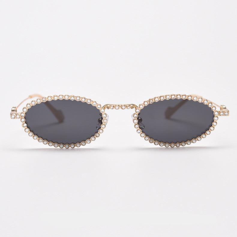 MieMie SR006 Round Oval Stylish Sunglasses, made from metal with a distinctive diamond rhinestone design. Equipped with polarized UV400 protection, these sunglasses offer exceptional defense against harmful rays, available in gold and silver color.