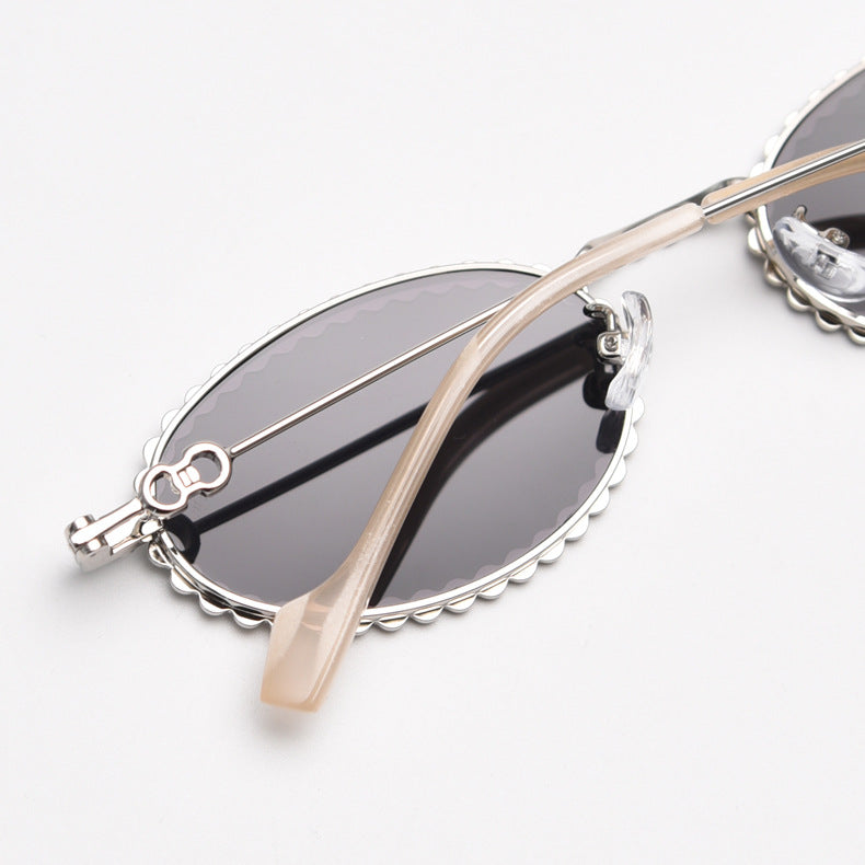 MieMie SR006 Round Oval Stylish Sunglasses, made from metal with a distinctive diamond rhinestone design. Equipped with polarized UV400 protection, these sunglasses offer exceptional defense against harmful rays, available in gold and silver color.