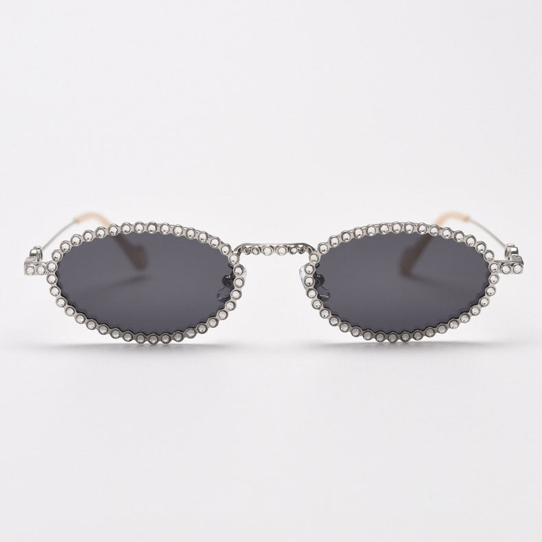 MieMie SR006 Round Oval Stylish Sunglasses, made from metal with a distinctive diamond rhinestone design. Equipped with polarized UV400 protection, these sunglasses offer exceptional defense against harmful rays, available in gold and silver color.