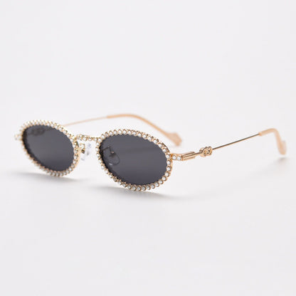 MieMie SR006 Round Oval Stylish Sunglasses, made from metal with a distinctive diamond rhinestone design. Equipped with polarized UV400 protection, these sunglasses offer exceptional defense against harmful rays, available in gold and silver color.