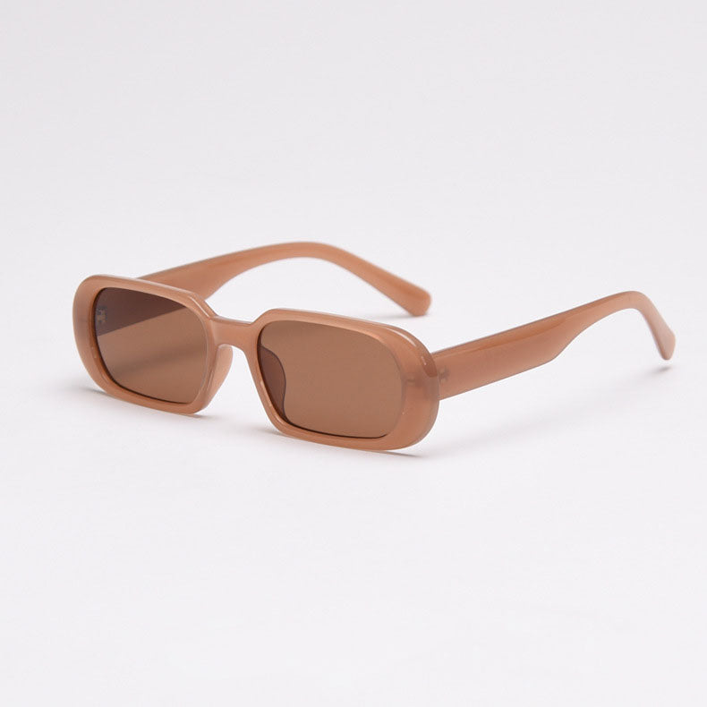 SRE001 MieMie Rectangle Sunglasses made from PC material and a distinctive rimless design, that enhances your look with flair. Equipped with UV400 protection, these sunglasses offer exceptional defense against harmful rays, making them ideal for a day at the beach or for fashion wear. Available in 8 colors: Pink, Black, Brown, Clear, Orange, White, Tortoise & Coffee