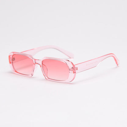 SRE001 MieMie Rectangle Sunglasses made from PC material and a distinctive rimless design, that enhances your look with flair. Equipped with UV400 protection, these sunglasses offer exceptional defense against harmful rays, making them ideal for a day at the beach or for fashion wear. Available in 8 colors: Pink, Black, Brown, Clear, Orange, White, Tortoise & Coffee