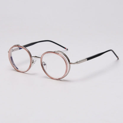 MieMie PR010 modern steampunk round prescription eyeglasses frame, made from TR90 material perfect for a stylish look. These small, lightweight frames come in various colors. Features ALL-IN-ONE lenses with multi-coating benefits like Anti-blue, Anti-scratch, and more, at no extra cost. Comes in 5 colors: Pink, Grey, Clear, Black, Brown