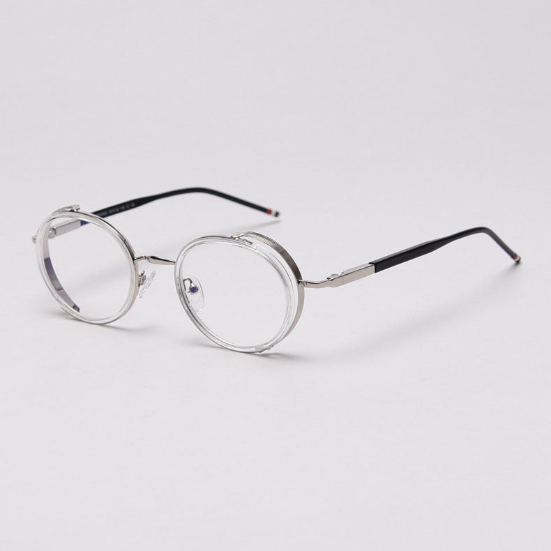 MieMie PR010 modern steampunk round prescription eyeglasses frame, made from TR90 material perfect for a stylish look. These small, lightweight frames come in various colors. Features ALL-IN-ONE lenses with multi-coating benefits like Anti-blue, Anti-scratch, and more, at no extra cost. Comes in 5 colors: Pink, Grey, Clear, Black, Brown