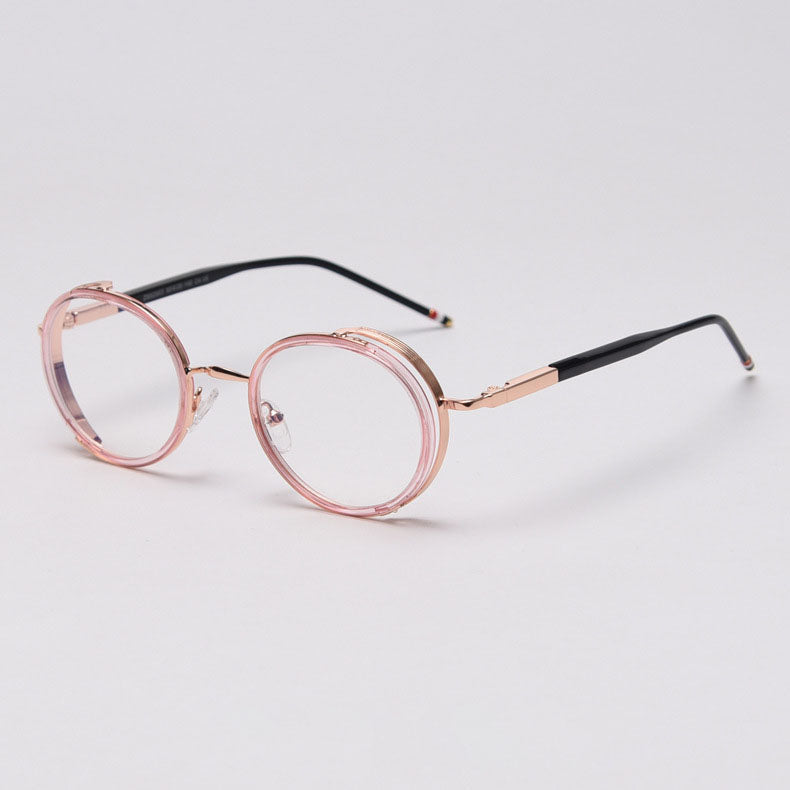 MieMie PR010 modern steampunk round prescription eyeglasses frame, made from TR90 material perfect for a stylish look. These small, lightweight frames come in various colors. Features ALL-IN-ONE lenses with multi-coating benefits like Anti-blue, Anti-scratch, and more, at no extra cost. Comes in 5 colors: Pink, Grey, Clear, Black, Brown