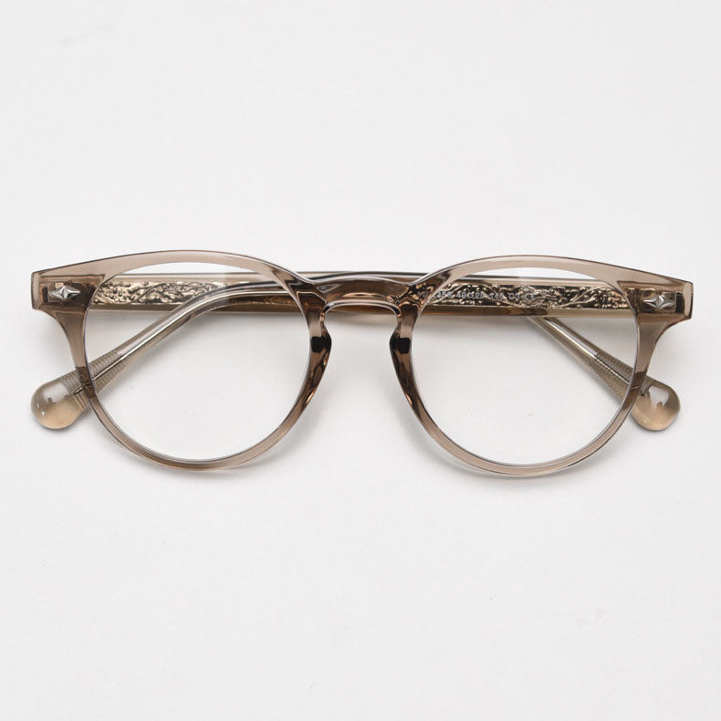 MieMie PR008 round vintage eyeglasses frame, perfect for a stylish look. These small, lightweight frames made from TR90 material. Features ALL-IN-ONE lenses with multi-coating benefits like Anti-blue, Anti-scratch, and more, at no extra cost. Available in 5 colors: Black, Clear, Green, Grey, Brown