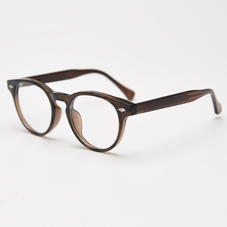 MieMie PR008 round vintage eyeglasses frame, perfect for a stylish look. These small, lightweight frames made from TR90 material. Features ALL-IN-ONE lenses with multi-coating benefits like Anti-blue, Anti-scratch, and more, at no extra cost. Available in 5 colors: Black, Clear, Green, Grey, Brown