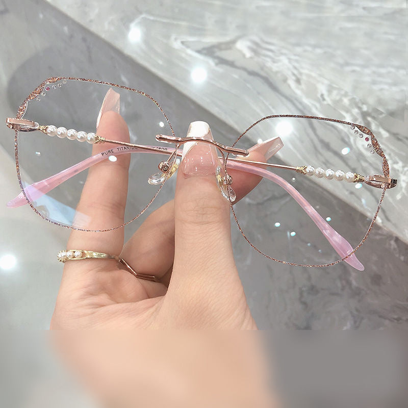 MieMie Shinning Pink Pearl-Embellished polygon glasses. Featuring durable Titanium frames in vibrant pink color. Our ALL-IN-ONE lenses offer blue light protection, anti-glare, and more at no extra cost. Perfect for fashion-forward Gen Z trendsetters!