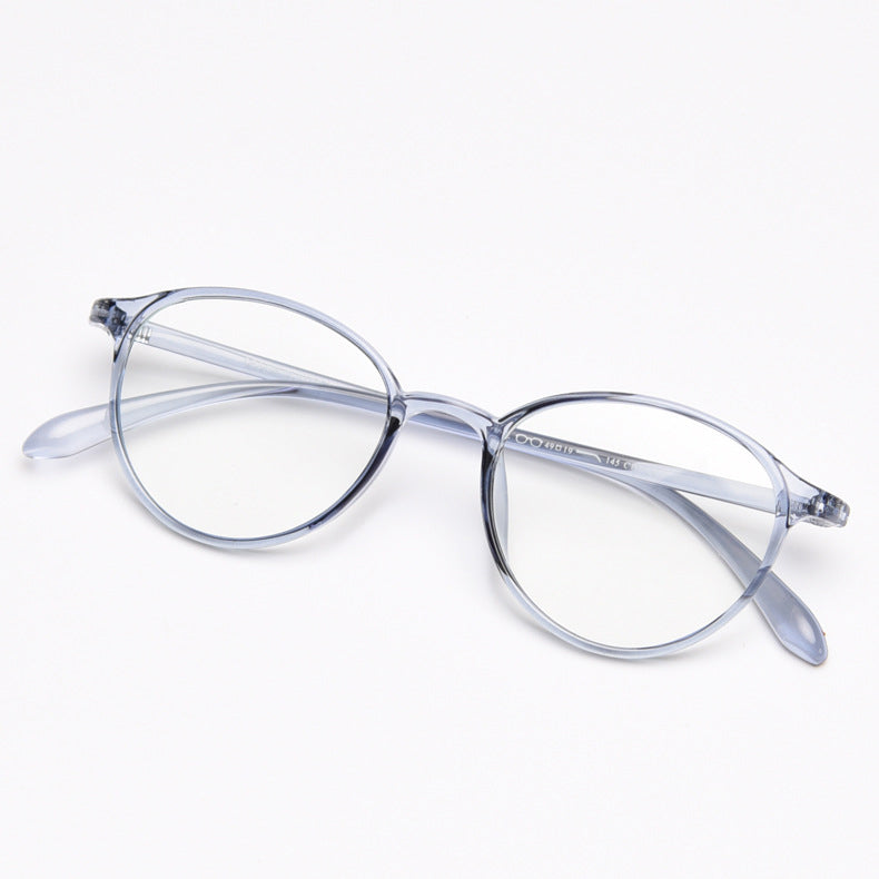 MieMie TR90 thin oval eyeglass frames available in multiple colors, including Black, Red Wine, Blue, Grey, Brown, Sky Blue, Oat Milk, Dark Brown, and Tortoise. Features ALL-IN-ONE lenses with multi-coating benefits: Anti-blue, Anti-allergic, Anti-scratch, Anti-glare, and Oil-resistant, suitable for both prescription and fashion wear.