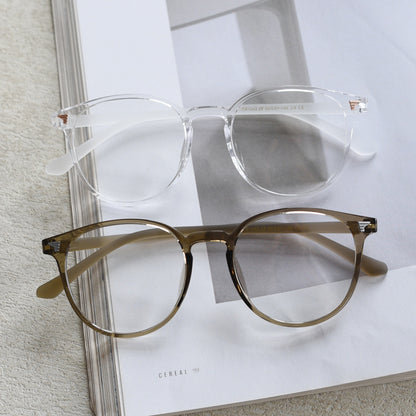 TR90 round frames in glossy black, transparent gray, white, olive green, coffee, cool-tone tea, gradient tea, and gradient coffee. Features ALL-IN-ONE lenses with multi-layer coatings: Anti-blue, Anti-allergic, scratch-resistant, anti-glare, and oil-resistant.