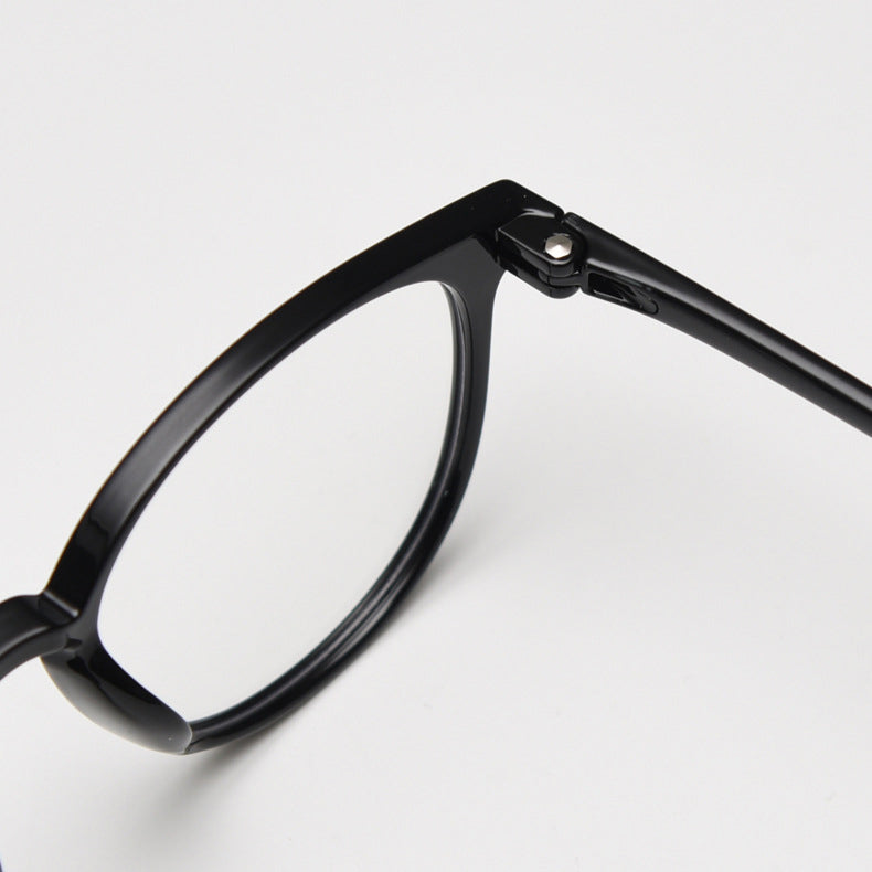 TR90 round frames in glossy black, transparent gray, white, olive green, coffee, cool-tone tea, gradient tea, and gradient coffee. Features ALL-IN-ONE lenses with multi-layer coatings: Anti-blue, Anti-allergic, scratch-resistant, anti-glare, and oil-resistant.