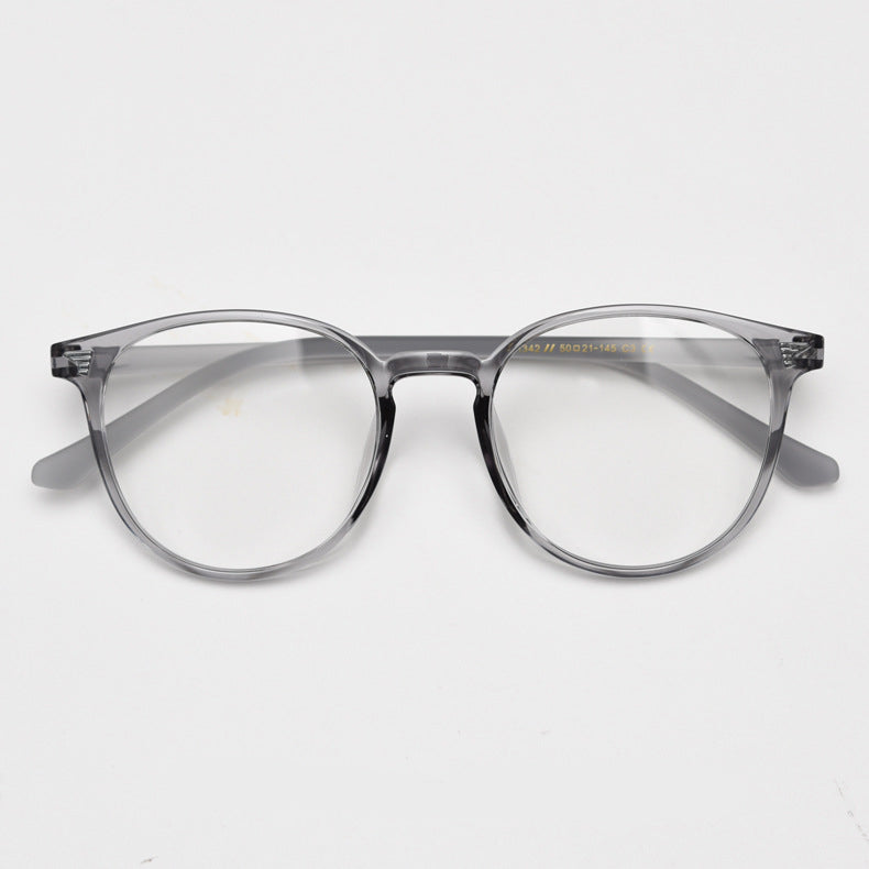 TR90 round frames in glossy black, transparent gray, white, olive green, coffee, cool-tone tea, gradient tea, and gradient coffee. Features ALL-IN-ONE lenses with multi-layer coatings: Anti-blue, Anti-allergic, scratch-resistant, anti-glare, and oil-resistant.