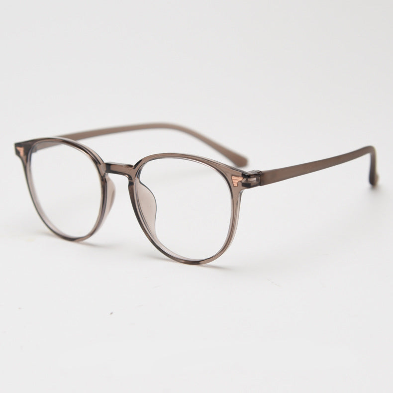 TR90 round frames in glossy black, transparent gray, white, olive green, coffee, cool-tone tea, gradient tea, and gradient coffee. Features ALL-IN-ONE lenses with multi-layer coatings: Anti-blue, Anti-allergic, scratch-resistant, anti-glare, and oil-resistant.