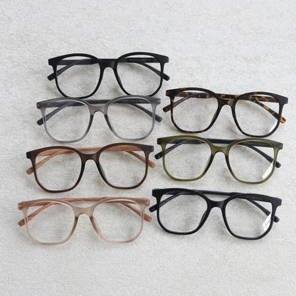 MieMie affordable TR90 wood-textured oversized eyeglass frames in multiple colors, including Brown, Coffee, Green, Grey, Tortoise, and Matte Black. Features ALL-IN-ONE lenses with multi-coating benefits like Anti-blue, Anti-scratch, Anti-glare, Anti-allergic, and Oil-resistant, offering a stylish and face-slimming look.