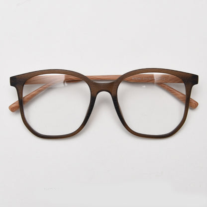 MieMie affordable TR90 wood-textured oversized eyeglass frames in multiple colors, including Brown, Coffee, Green, Grey, Tortoise, and Matte Black. Features ALL-IN-ONE lenses with multi-coating benefits like Anti-blue, Anti-scratch, Anti-glare, Anti-allergic, and Oil-resistant, offering a stylish and face-slimming look.