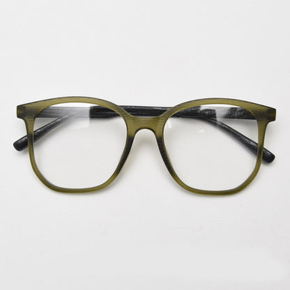 MieMie affordable TR90 wood-textured oversized eyeglass frames in multiple colors, including Brown, Coffee, Green, Grey, Tortoise, and Matte Black. Features ALL-IN-ONE lenses with multi-coating benefits like Anti-blue, Anti-scratch, Anti-glare, Anti-allergic, and Oil-resistant, offering a stylish and face-slimming look.