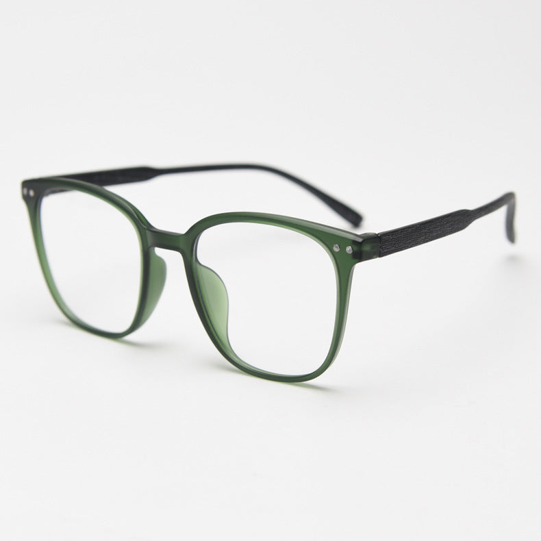 MieMie affordable TR90 wood-textured oversized eyeglass frames in multiple colors, including Brown, Coffee, Green, Grey, Tortoise, and Matte Black. Features ALL-IN-ONE lenses with multi-coating benefits like Anti-blue, Anti-scratch, Anti-glare, Anti-allergic, and Oil-resistant, offering a stylish and face-slimming look.