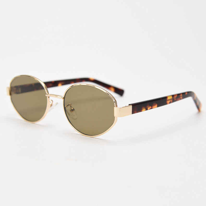 MieMie SR003 Round Oval sunglasses is crafted with lightweight and polished metal frames, featuring UV400 protection function a leather-decorated design, effortlessly complementing any outfit. With their street-style flair, perfect for making a fashionable statement. Available in 3 colors: Tortoise, Black &amp; Silver