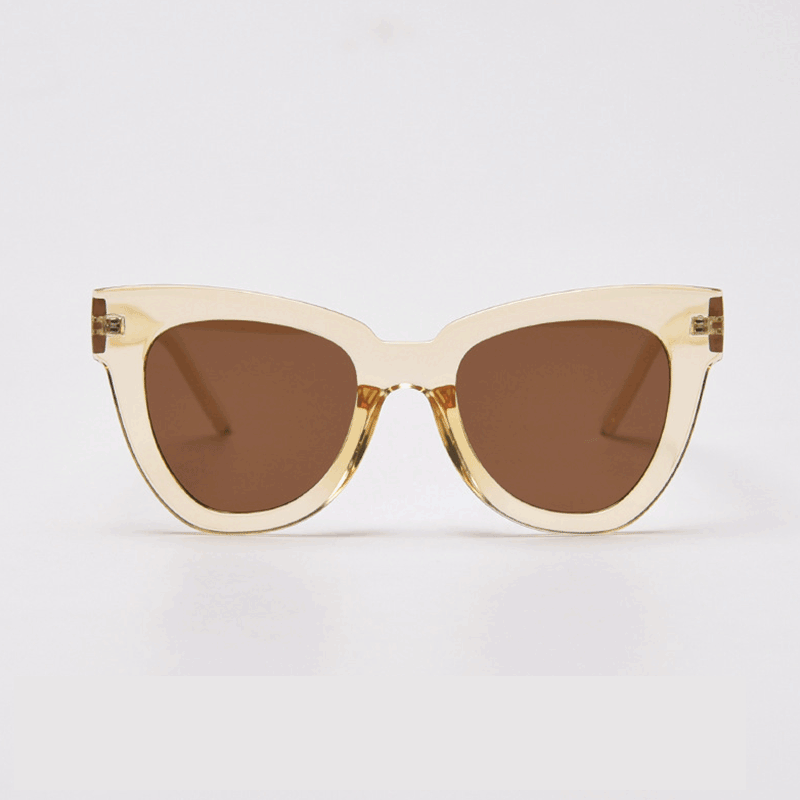 Elevate your style with MieMie SC004 Sunglasses in a striking cream shade for UV400 protection and bold frame. These chic cat-eye frames for women are crafted from lightweight PC material, providing both elegance and durability. Comes in distinctive color choices: pink, black, tortoise, grey, yellow, red, black tortoise, beige