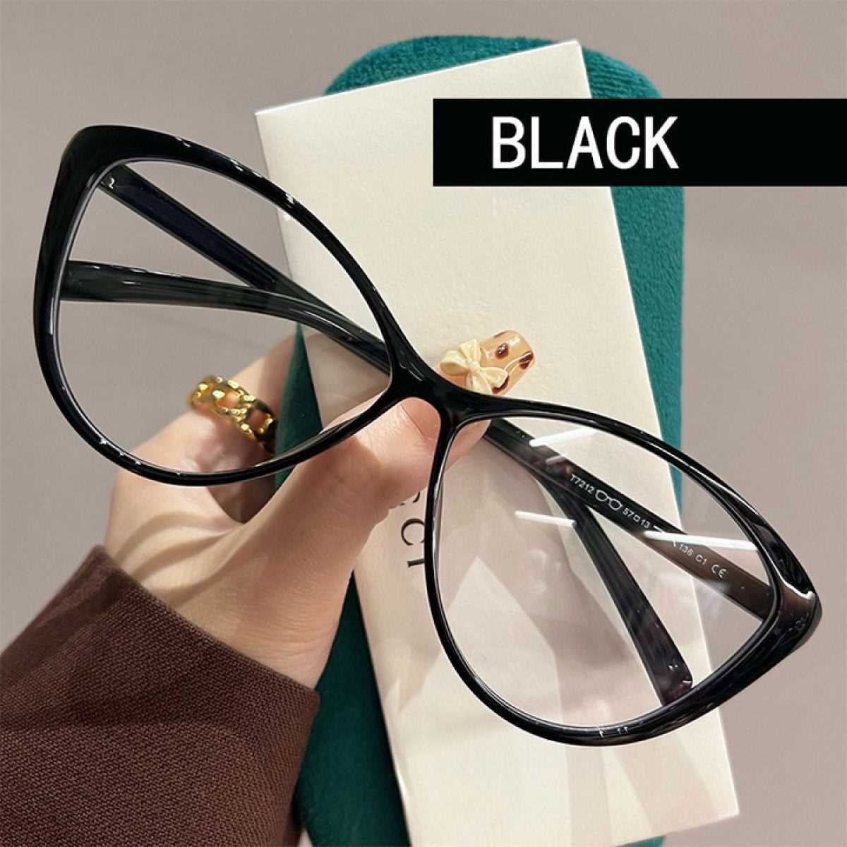 MieMie Bold Black Matte Cat-Eye Prescription Glasses featuring a sleek, stylish cat-eye shape with a bold matte black finish, designed for a modern and chic look, made from TR90 material, PC001 Black Color