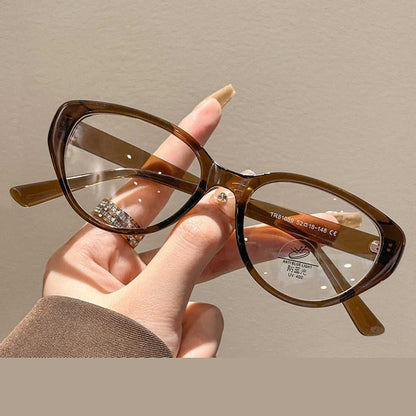 Close-up view of MieMie Tortoise Matte Oval Prescription Glasses, featuring a stylish tortoiseshell pattern with a soft matte finish. The oval frames showcase elegant lines and a classic design, highlighting the lenses which are designed for prescription use, made from TR90 material, PO001 Brown Color